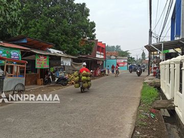 Rumah lahan luas di pinggir jalan raya Caringin Depok