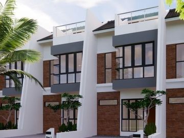 Rumah cluster 2,5 lt dekat ke pintu toll kukusan di Beji Depok Ada Rooftop nya (noey)
