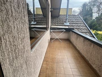 Casa en excelente barrio residencial dentro de la ciudad