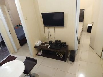 Apartemen green pramuka city bulanan full furnish wifi ready