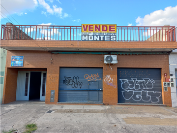 CASA con LOCALES sobre AV MARCONI