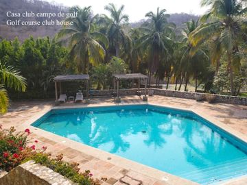 Condominio cerca de la playa, terraza común con vista al mar, alberca y gimnasio