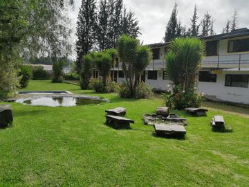 VENTA TERRENO COMERCIAL CAYAMBE, 10819M2 FRENTE A LA PANA NORTE