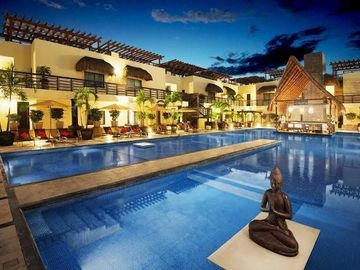 Departamento de una recámara decoración tipo Bali, amenidades de lujo