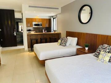 Departamento de una recámara decoración tipo Bali, amenidades de lujo