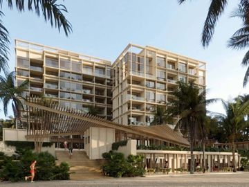 Condominio cerca del mar con terraza, asador y barra de entretenimiento