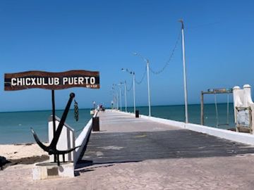 Condominio cerca del mar con terraza, asador y barra de entretenimiento