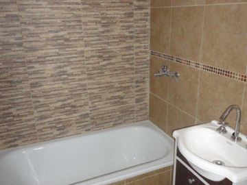 VENTA DE DEPARTAMENTO 2 AMBIENTES A ESTRENAR - CON COCHERA - PRIMER PISO AL FRENTE
