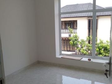 Rumah cluster dalam perumahan 2 lt 1,2 M di Kalibaru Depok dengan konsep modern dan minimalis