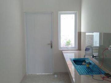 Rumah cluster dalam perumahan 2 lt 1,2 M di Kalibaru Depok dengan konsep modern dan minimalis