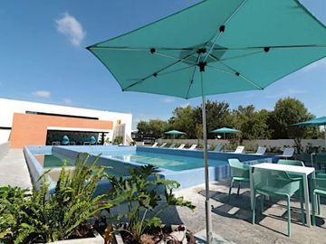 Departamento 1 recamaras más estudio, con alberca, área de juegos para niños