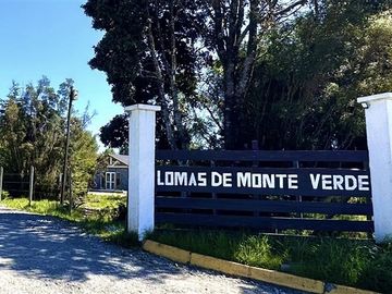 Parcela con linda casa en condominio Lomas de Monteverde