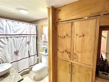 Parcela con linda casa en condominio Lomas de Monteverde