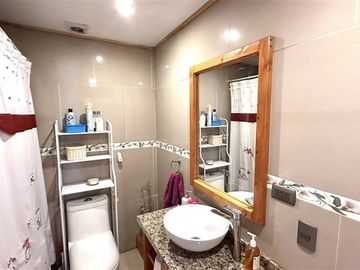 Parcela con linda casa en condominio Lomas de Monteverde