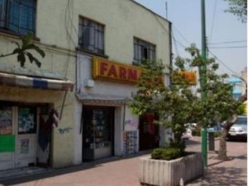 EDIFICIO CON 12 DEPTOS Y 5 LOCALES COMERCIALES