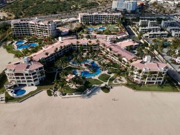 Departamento a pasos del mar, alberca, gimnasio y cancha de tennis, en venta  co