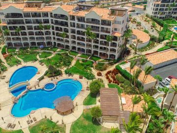 Departamento a pasos del mar, alberca, gimnasio y cancha de tennis, en venta  co