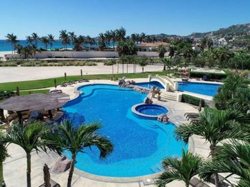 Departamento a pasos del mar, alberca, gimnasio y cancha de tennis, en venta  co