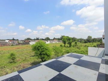 Rumah minimalis 2 lantai dekat Pamela 7