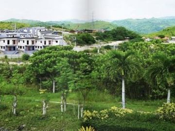 TOWNHOUSES & HOUSES FOR SALE AT AMOA SUBDIVISION IN BRGY TAMIAO , CABADIANGAN , COMPOSTELA, CEBU
