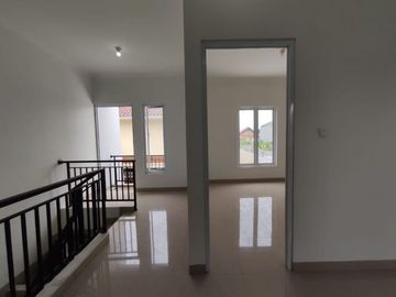 Rumah free biaya,bonus AC dan toren lokasi strategis, dekat jalan utama