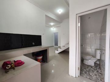 Rumah free biaya,bonus AC dan toren lokasi strategis, dekat jalan utama