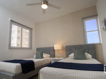 Departamento en Residencial en una de las principales Avenidas de Cancún (Entrega Inmediata)