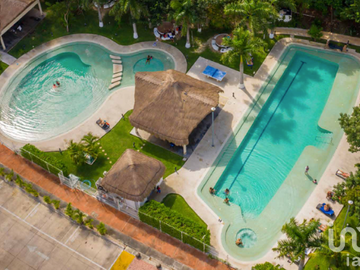 Departamento en Residencial en una de las principales Avenidas de Cancún (Entrega Inmediata)