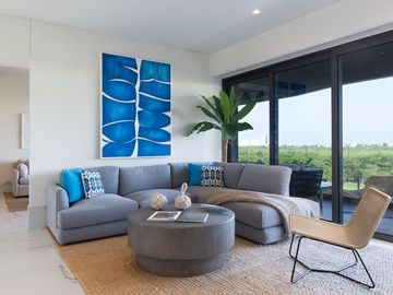 Condominio en edificio sustentable con vista al mar, campo de golf