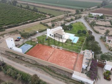 ¡Oportuniad única en un lote para tu casa de campo  en Cañete!