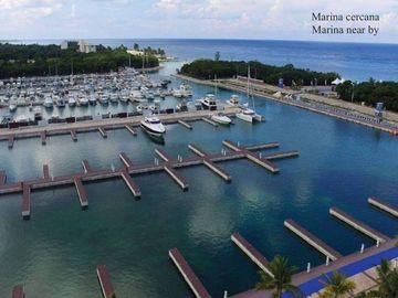 Apartamento frente al mar con rooftop y alberca privada, venta en Cozumel