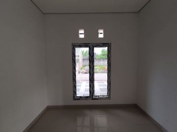 RUMAH MURAH SIAP HUNI DEKAT SMA TARUNA 150MTR JALAN RAYA