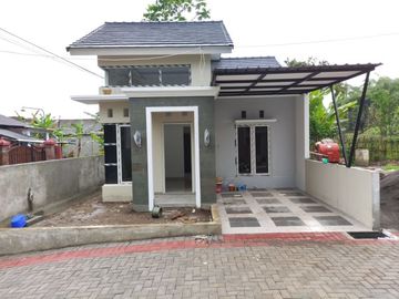 RUMAH MURAH SIAP HUNI DEKAT SMA TARUNA 150MTR JALAN RAYA