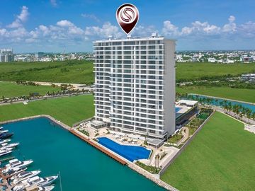 Condo frente a marina, vistas al campo de golf y reserva natural con acabados de
