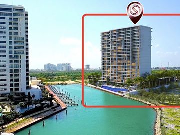 Condo frente a marina, vistas al campo de golf y reserva natural con acabados de