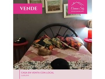 Casa en venta con local comercial