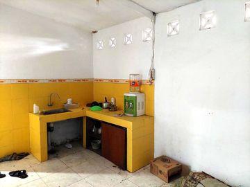 Rumah Nyaman Lingkungan Perumahan di Jalan Kabupaten
