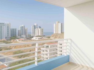 Apartamento con vista urbana costera, a pasos de la playa y comercio esencial.
