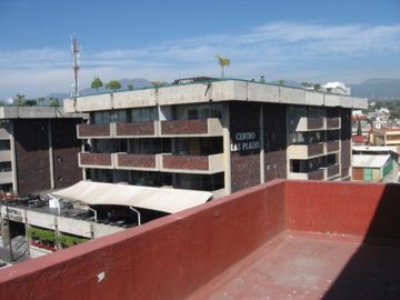 Edificio con frente al zócalo