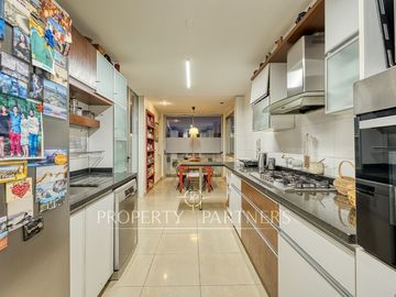 Penthouse en barrio exclusivo, vista asegurada