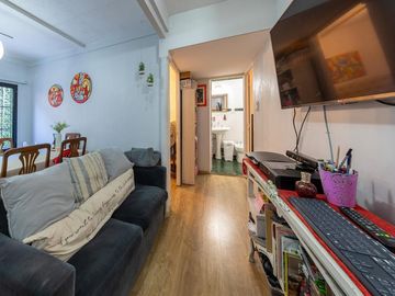 EN VENTA - DEPARTAMENTO DE PASILLO DOS DORMITORIOS CON PATIO - BARRIO ECHESORTU