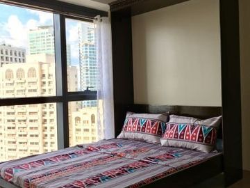 Fully furnished executive studio condo with parking