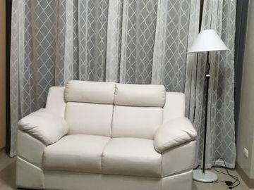 Fully furnished executive studio condo with parking