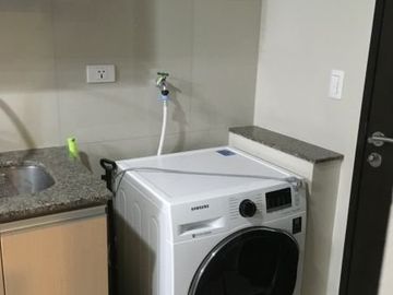 Fully furnished executive studio condo with parking