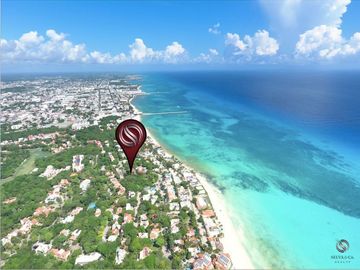 Propiedad con 2 departamentos a pasos de la playa en Playacar fase 1