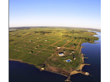 VENDO LOTES PUERTO MBIGUA - FRENTE AL RIO PARANA DESDE US$ 15.000