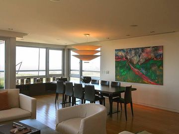 VENDE ESPECTACULAR SEMIPISO Muy alto vista al río en torre LE PARC Pto. Madero y cocheras