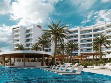 Condo con terraza que tiene vista al mar, cuatro recamaras, alberca, pre-venta,