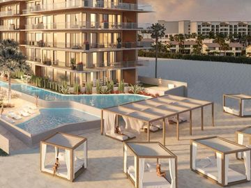 Condominio con vista al mar, techos altos, club de playa, concierge, carril de n