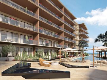 Condominio con vista al mar, techos altos, club de playa, concierge, carril de n